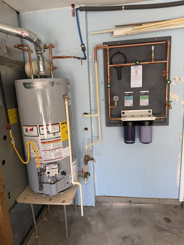 50-gal A.O. Smith installation with whole-home filtration